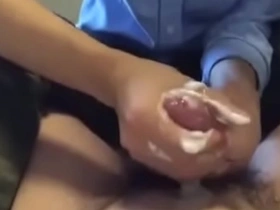 Gay Asian gets a fantastic handjob with milk and cum