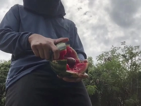 Solo Asian amateur masturbates with watermelon and ejaculates.