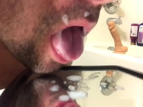 Homosexual masturbation ends with a big ejaculation, followed by consumption of semen
